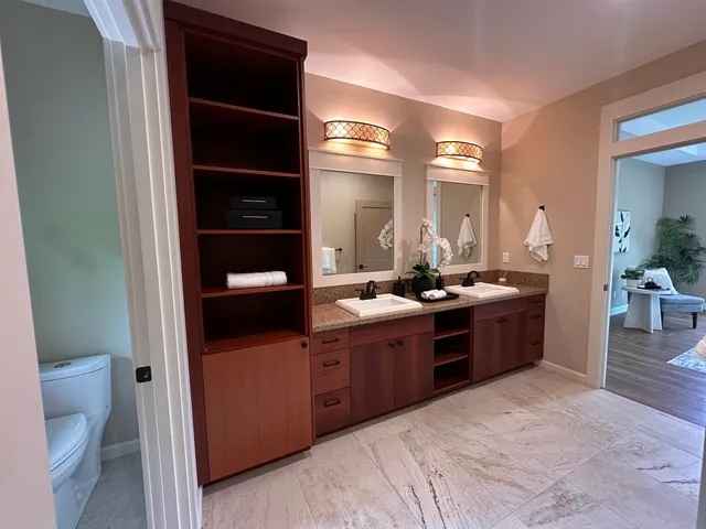 a bathroom with a glass shower door