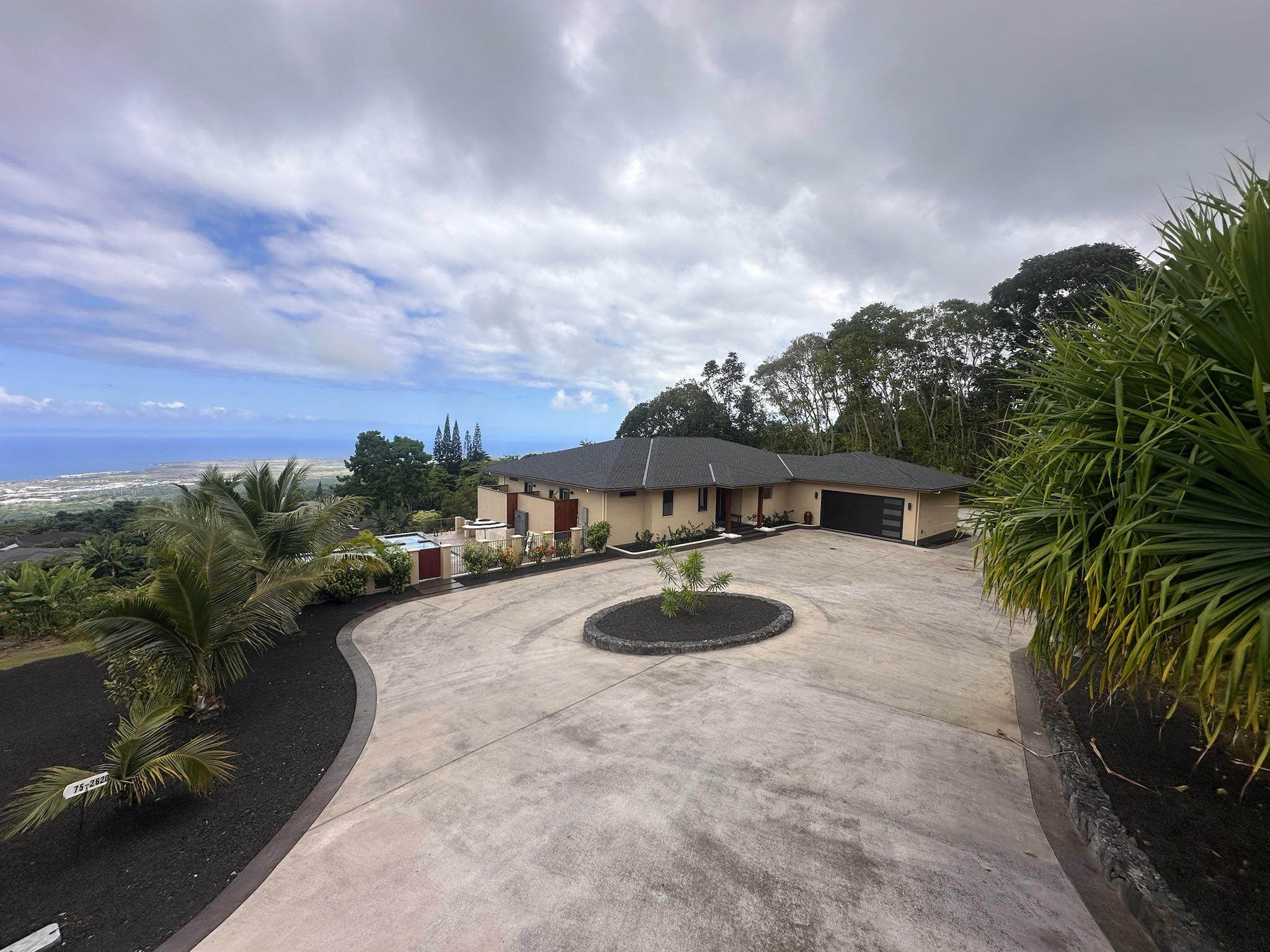 75-2620 Keopu Lani Road Holualoa, HI 96725 - Photo 8 of 30 a view of a house with a yard and sitting area