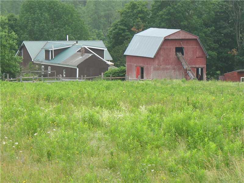 118 Guilford Center Road Guilford, ME 04443 - Photo 4 of 26 Exterior Back. View from upper field