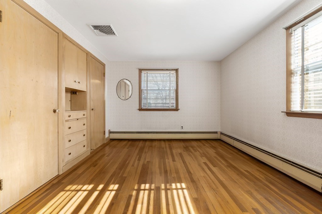 11 Haven Way Beverly, MA 01915 - Photo 15 of 29 a view of a room with wooden floor and window