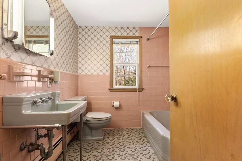 11 Haven Way Beverly, MA 01915 - Photo 18 of 29 a bathroom with a sink toilet and shower