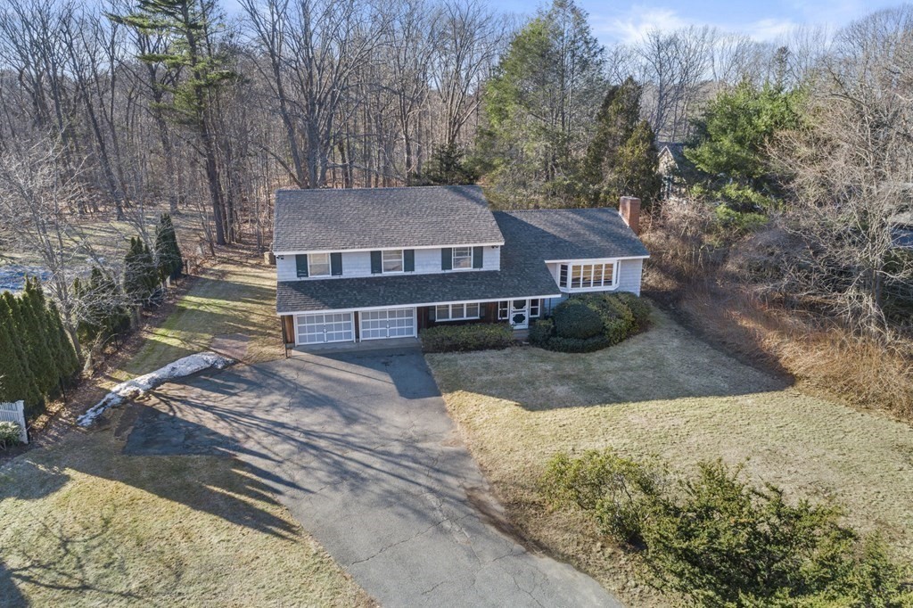 11 Haven Way Beverly, MA 01915 - Photo 2 of 29 a view of a house with a yard covered in snow