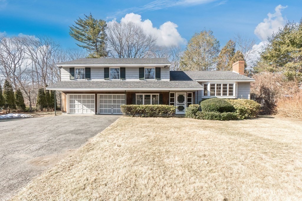 11 Haven Way Beverly, MA 01915 - Photo 25 of 29 front view of a house with a yard