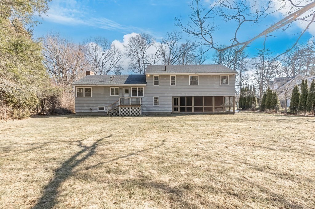 11 Haven Way Beverly, MA 01915 - Photo 26 of 29 a front view of a house with a yard