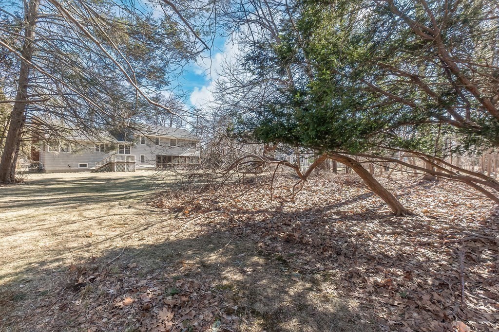 11 Haven Way Beverly, MA 01915 - Photo 27 of 29 a backyard of a house with lots of green space