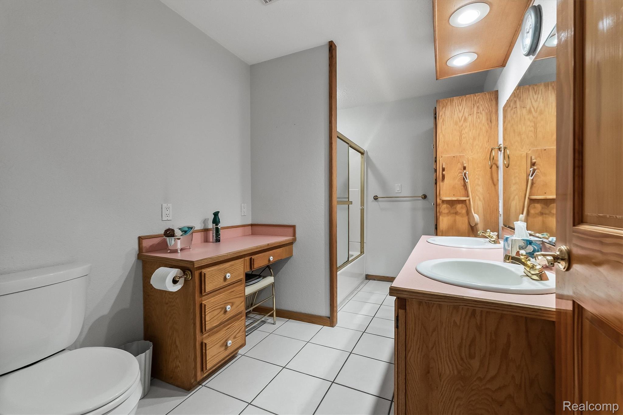 3553 North State Road Owosso, MI 48867 - Photo 22 of 45 Dual vanity with under-sink cabinetry and integrated sinks