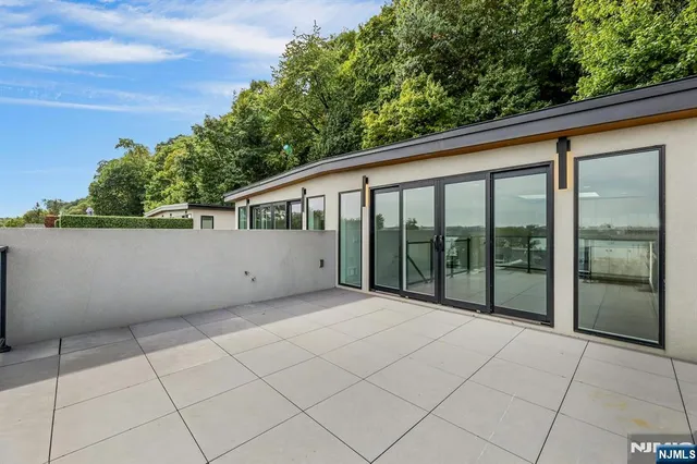 a view of a balcony with an outdoor space