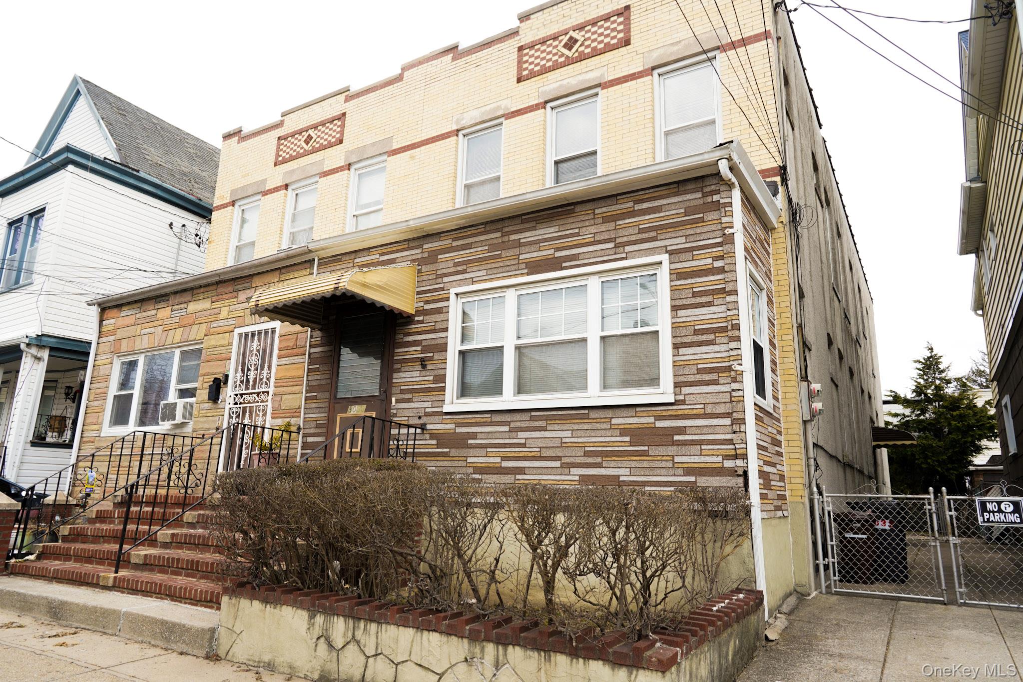 80-33 90th Road Queens, NY 11421 - Photo 2 of 20 front view of a building
