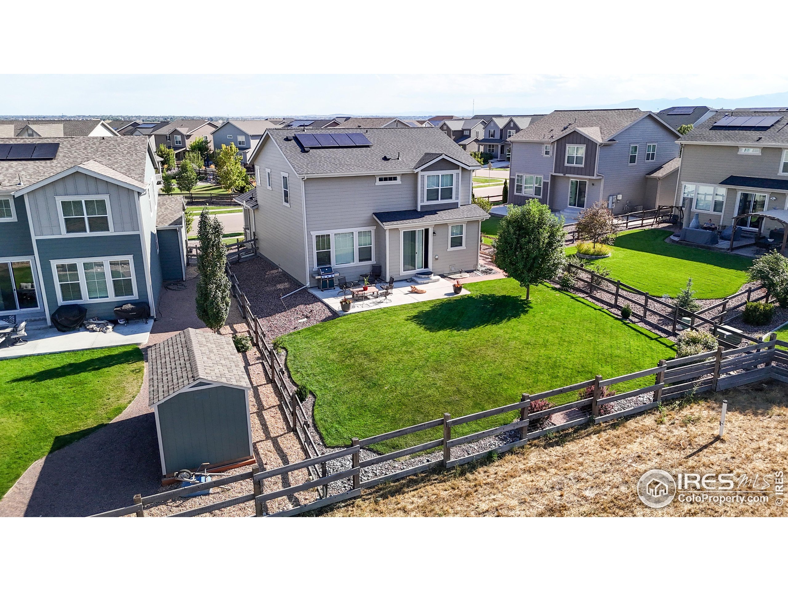 4861 St Vrain Road Firestone, CO 80504 - Photo 30 of 43 a house view with a garden space