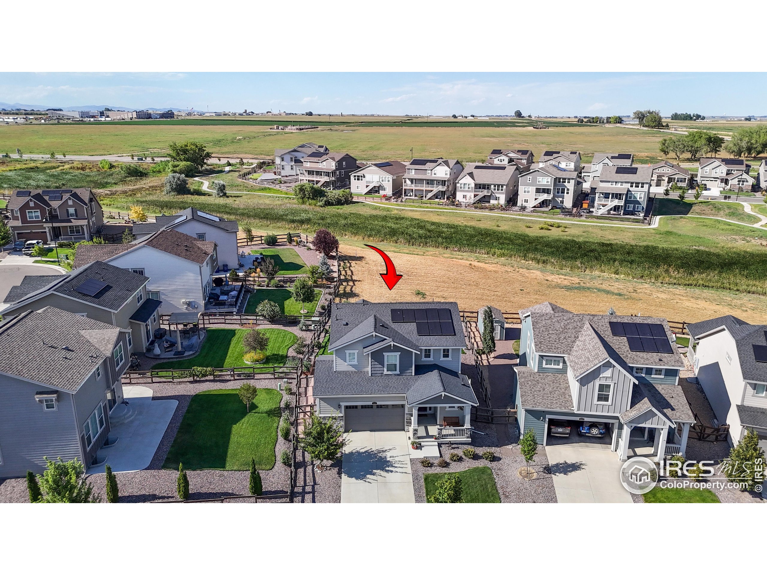 4861 St Vrain Road Firestone, CO 80504 - Photo 4 of 43 a view of a city with an ocean view