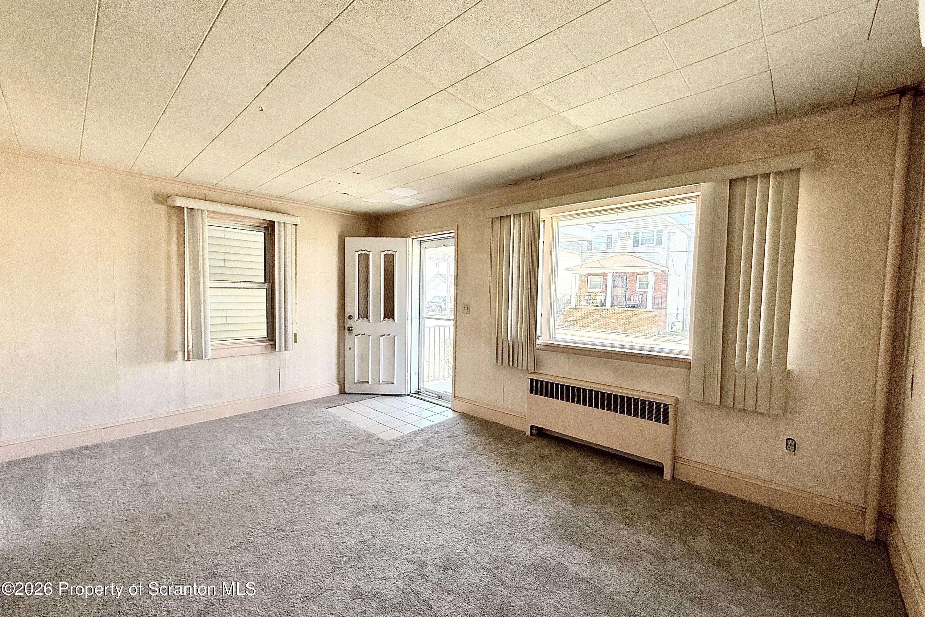 313 Dolph Street Jessup, PA 18434 - Photo 14 of 29 a view of an empty room with a window