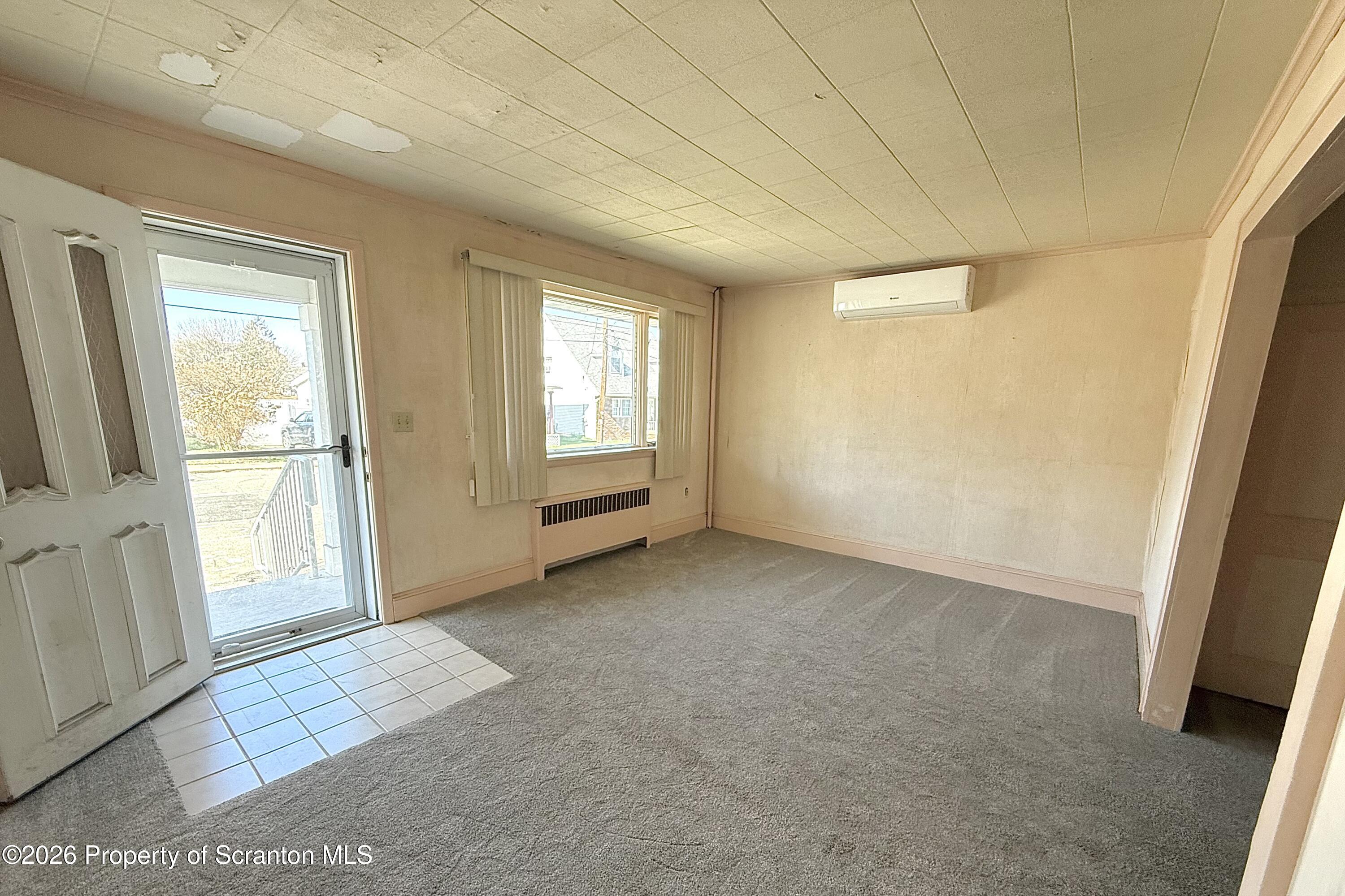 313 Dolph Street Jessup, PA 18434 - Photo 15 of 29 an empty room with windows