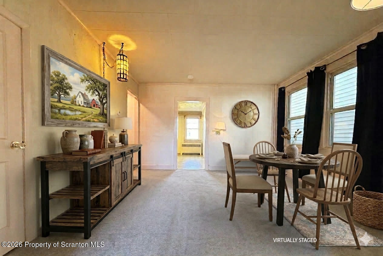 313 Dolph Street Jessup, PA 18434 - Photo 17 of 29 a view of a dining room with furniture window and wooden floor