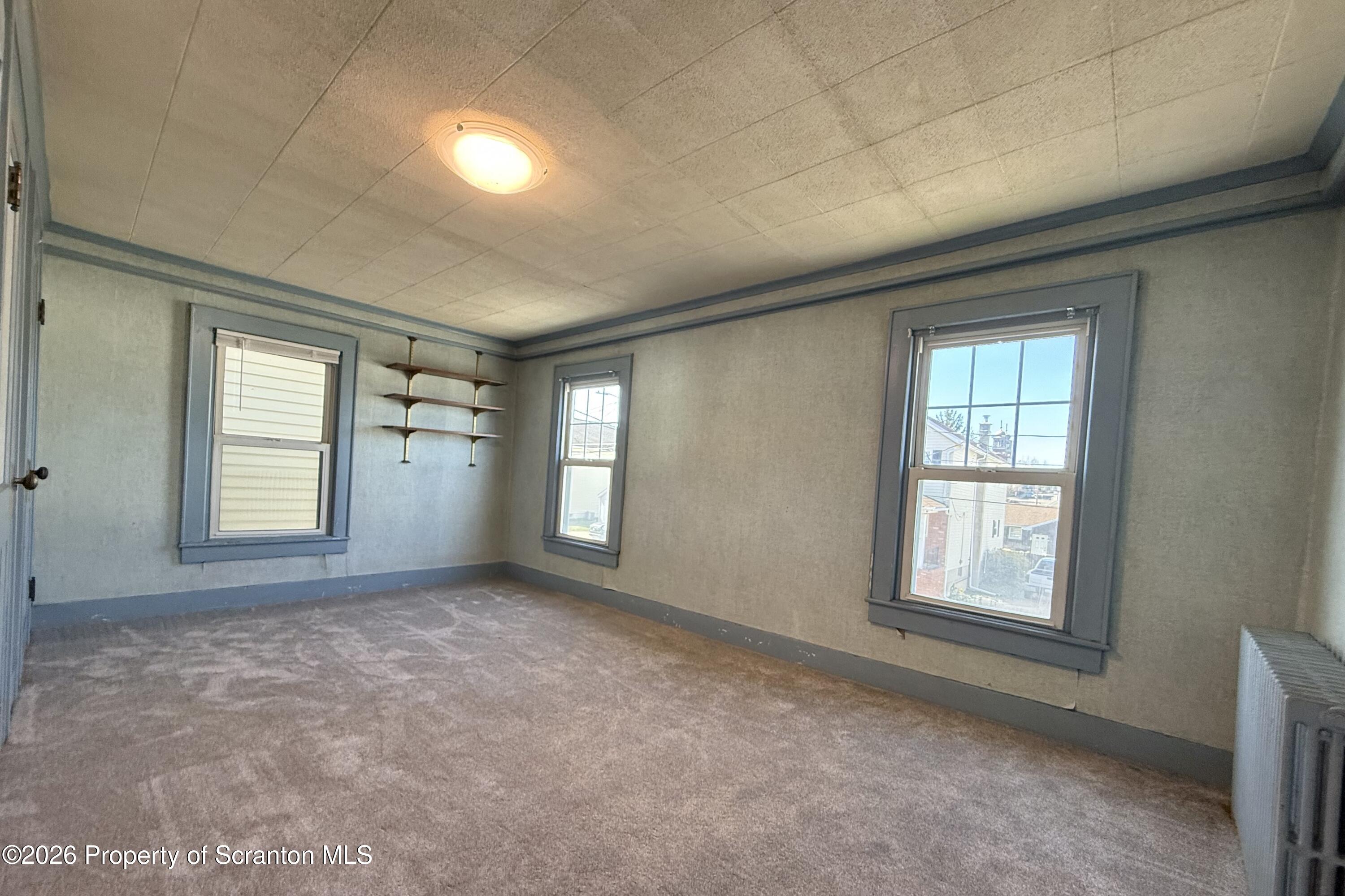 313 Dolph Street Jessup, PA 18434 - Photo 26 of 29 an empty room with windows
