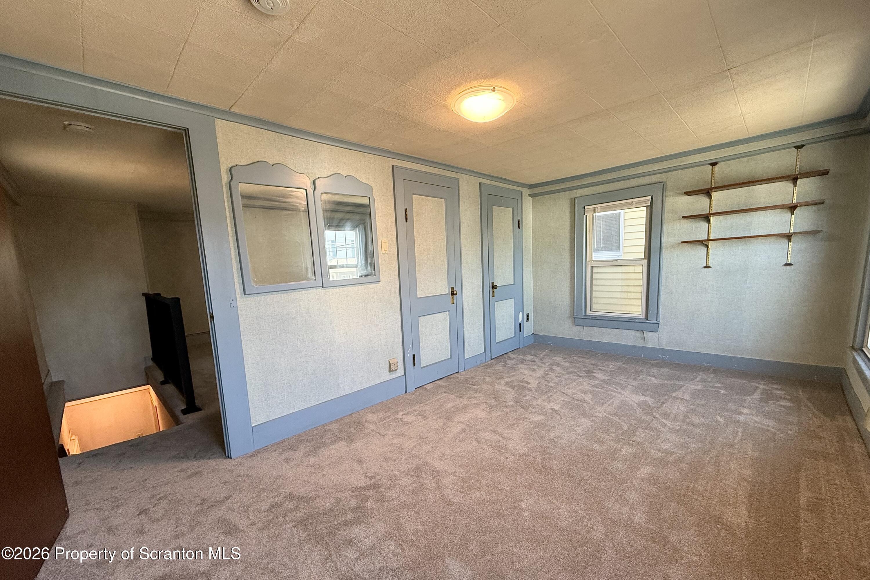 313 Dolph Street Jessup, PA 18434 - Photo 28 of 29 an empty room with windows