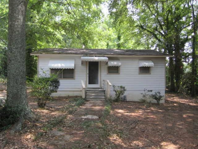 34 Pearl Hall Road Newnan, GA 30263 - Photo 1 of 1 front view of a house with a tree