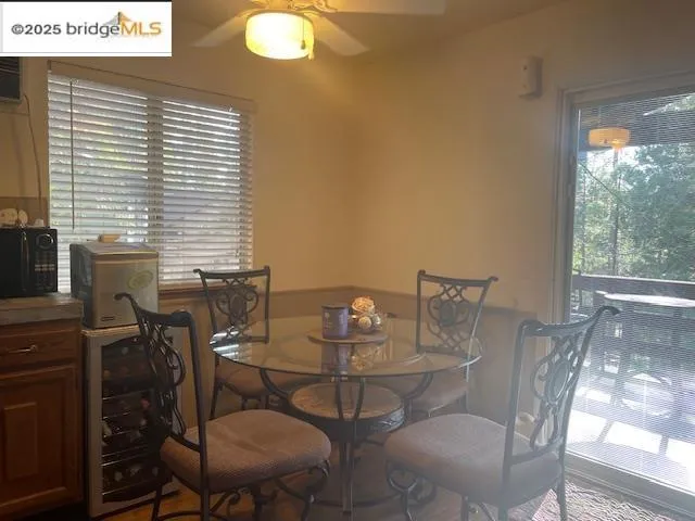 a view of a glass door and a living room