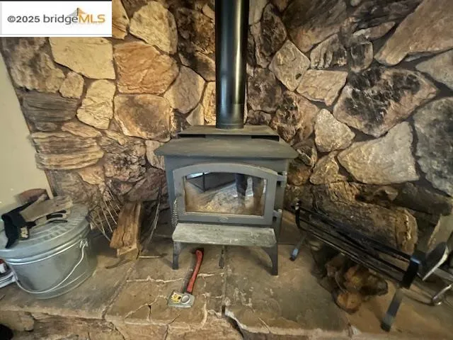 a living room with a couch and a fireplace