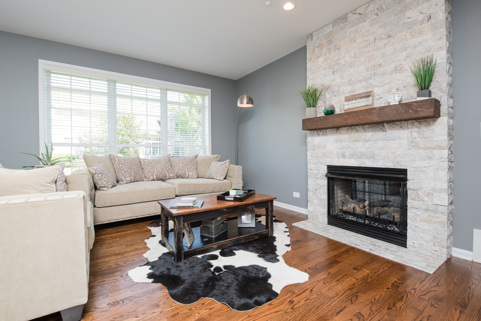 524 Bridgestone Court Inverness, IL 60010 - Photo 12 of 44 a living room with furniture and a fireplace