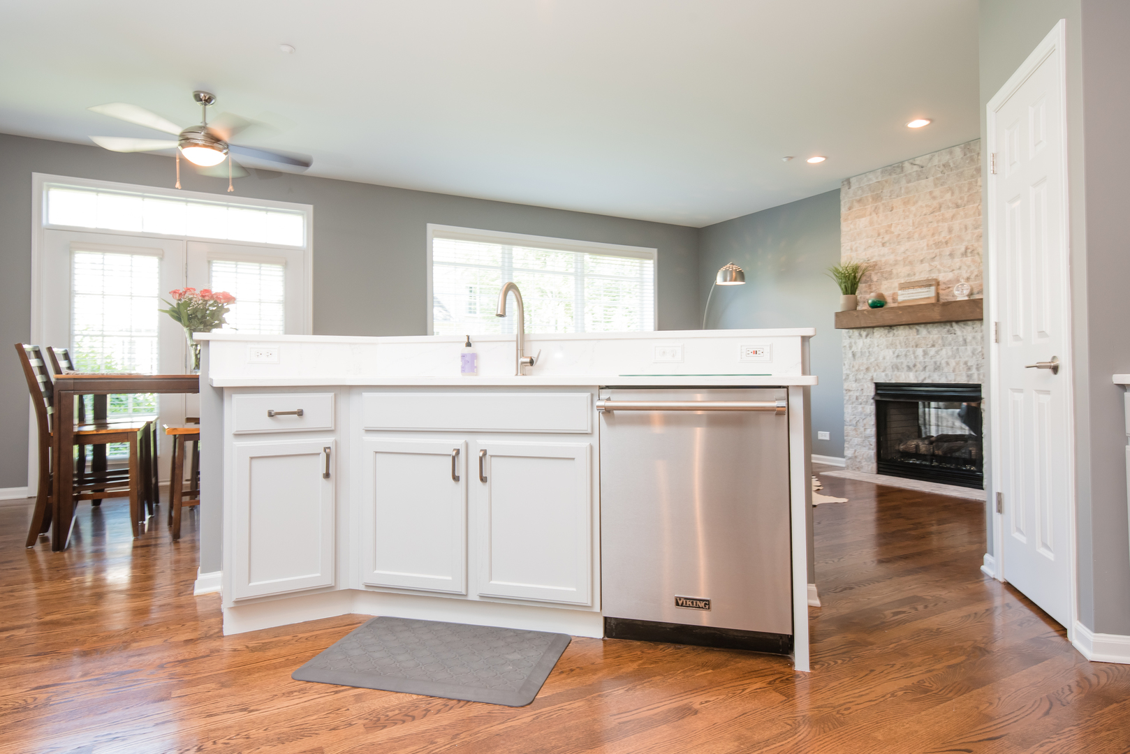 524 Bridgestone Court Inverness, IL 60010 - Photo 18 of 44 a kitchen with a sink cabinets and wooden floor