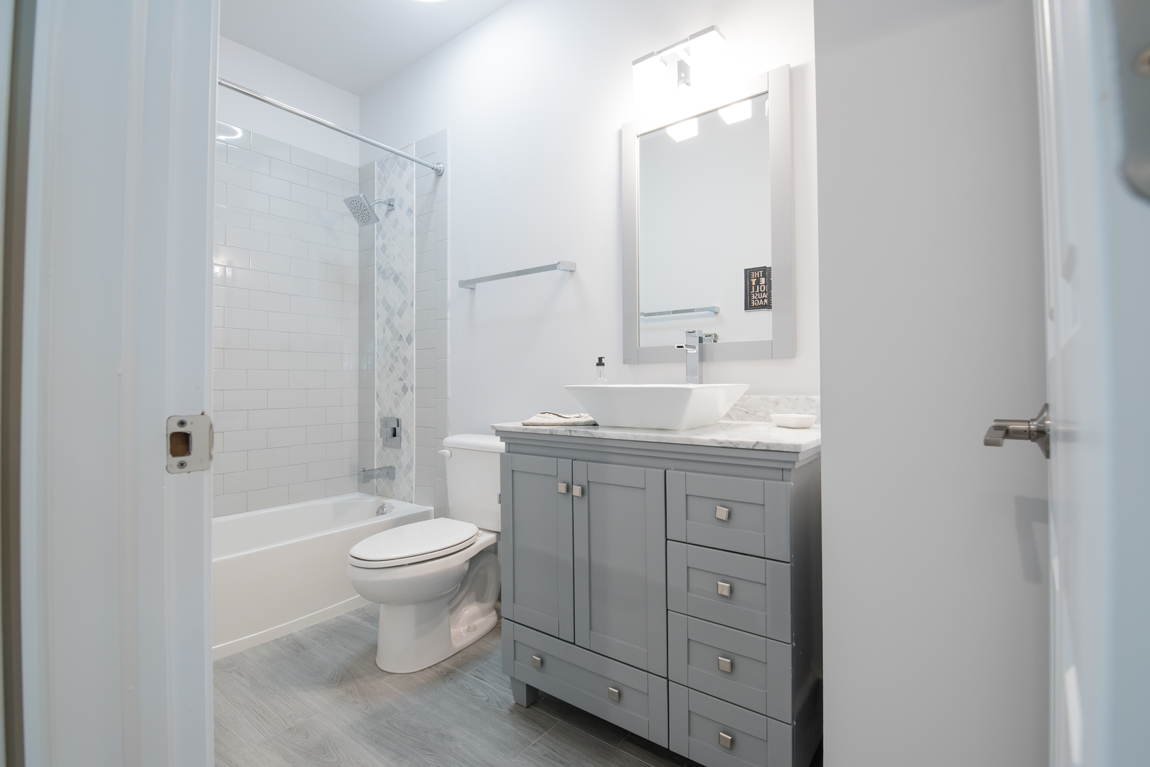 524 Bridgestone Court Inverness, IL 60010 - Photo 19 of 44 a bathroom with a granite countertop toilet a sink and a mirror
