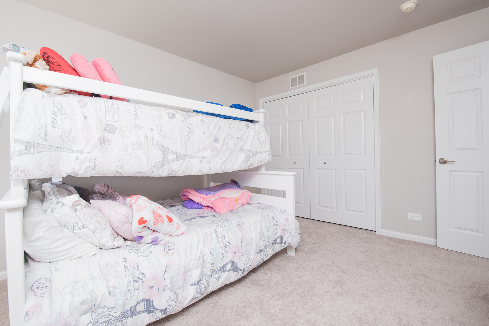524 Bridgestone Court Inverness, IL 60010 - Photo 24 of 44 a bedroom with a bed and a white wall painting