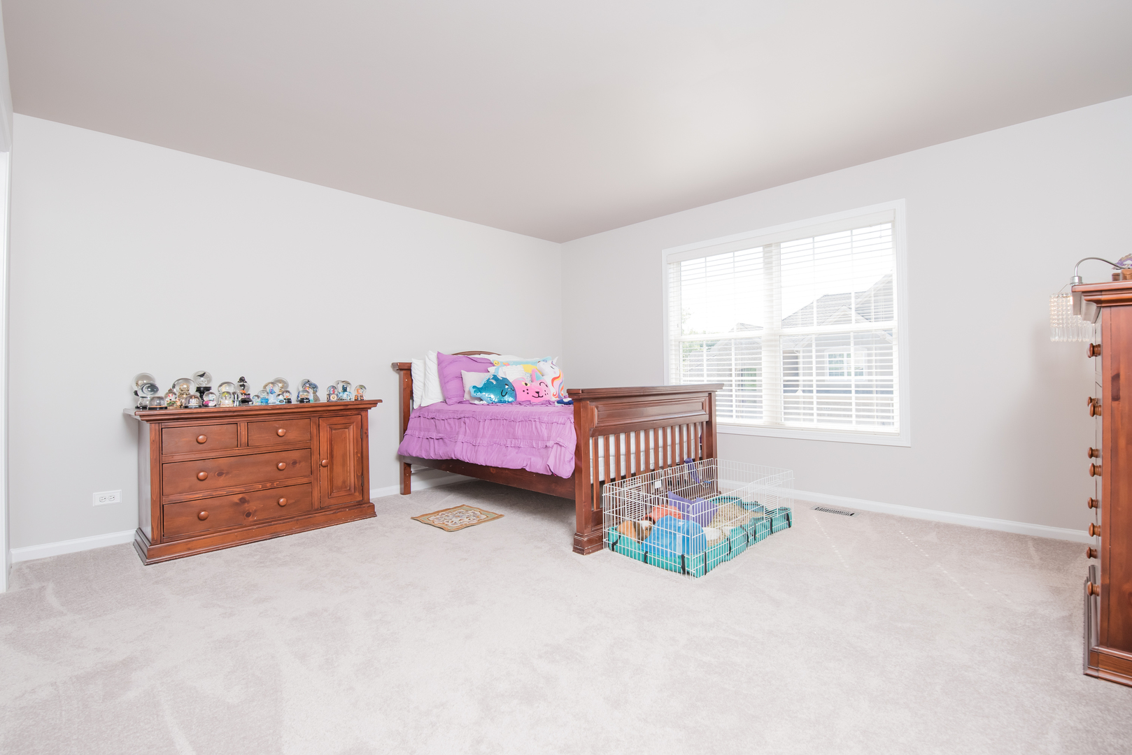 524 Bridgestone Court Inverness, IL 60010 - Photo 25 of 44 a living room with furniture and a dresser