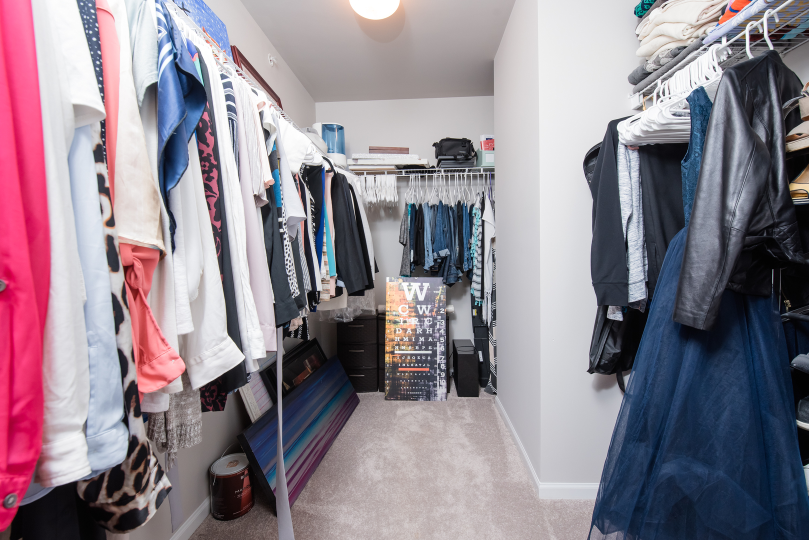 524 Bridgestone Court Inverness, IL 60010 - Photo 32 of 44 a view of walk in closet with clothes and shoes