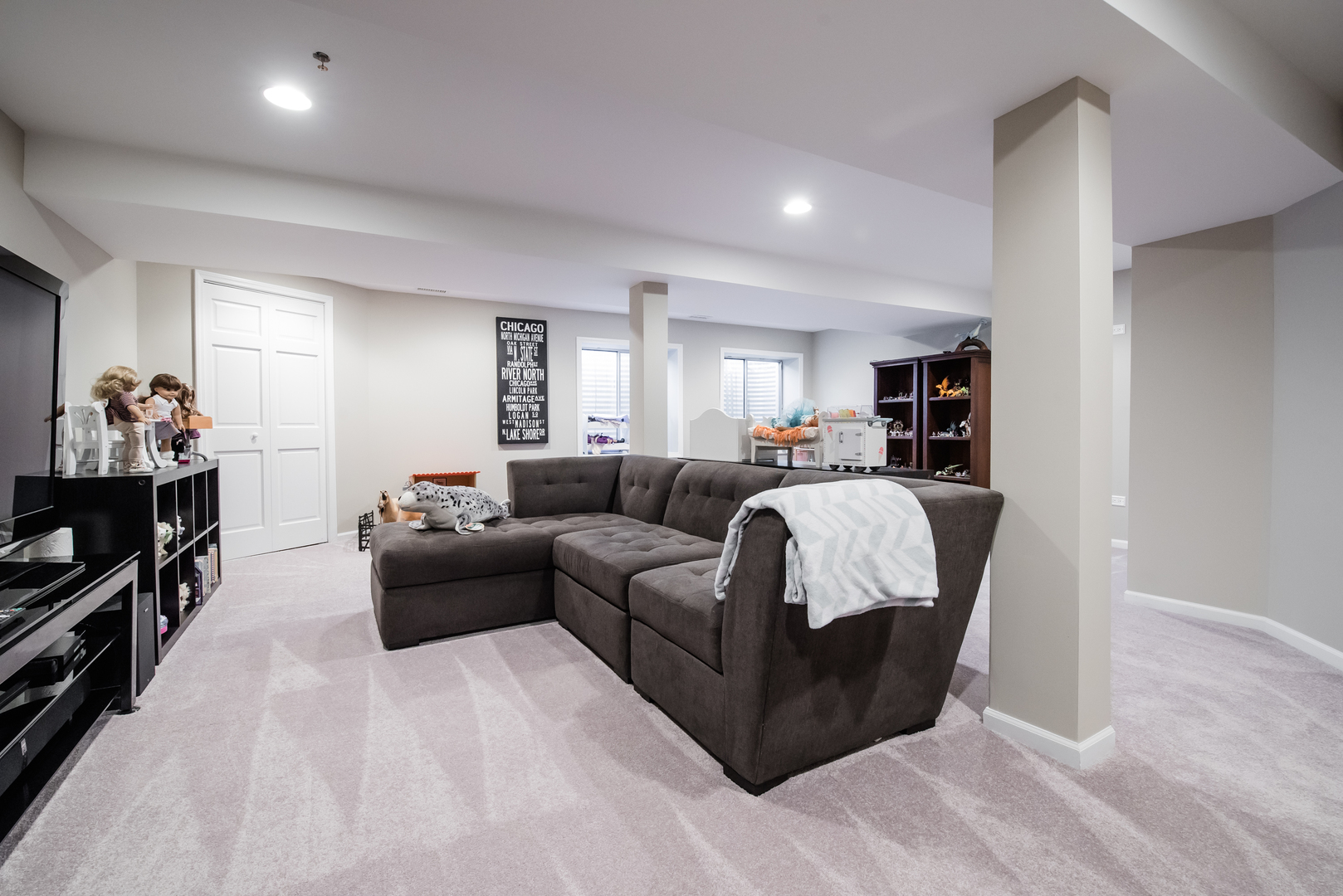 524 Bridgestone Court Inverness, IL 60010 - Photo 37 of 44 a living room with furniture and a flat screen tv