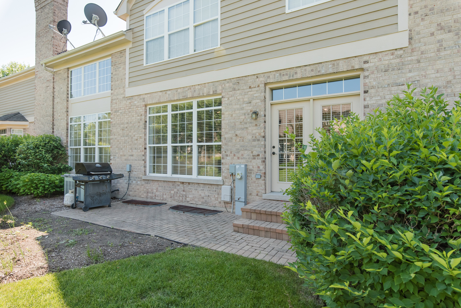 524 Bridgestone Court Inverness, IL 60010 - Photo 42 of 44 a view of a house with backyard and sitting area