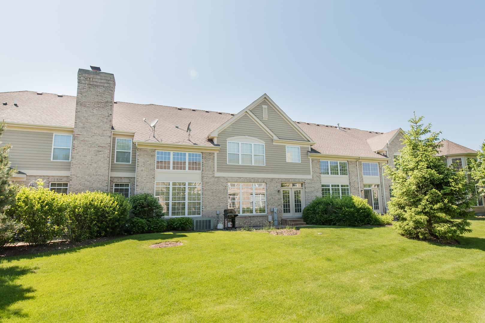 524 Bridgestone Court Inverness, IL 60010 - Photo 43 of 44 a front view of a house with a yard and outdoor seating