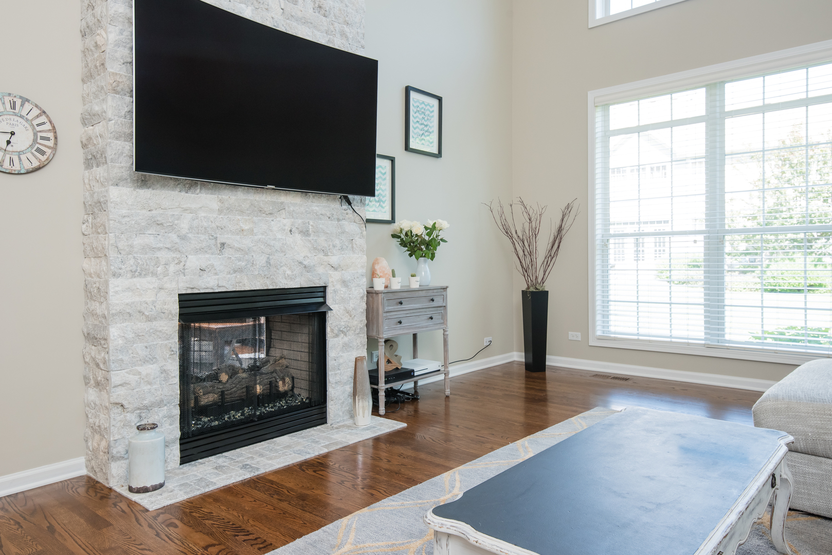 524 Bridgestone Court Inverness, IL 60010 - Photo 9 of 44 a living room with furniture a flat screen tv and a fireplace