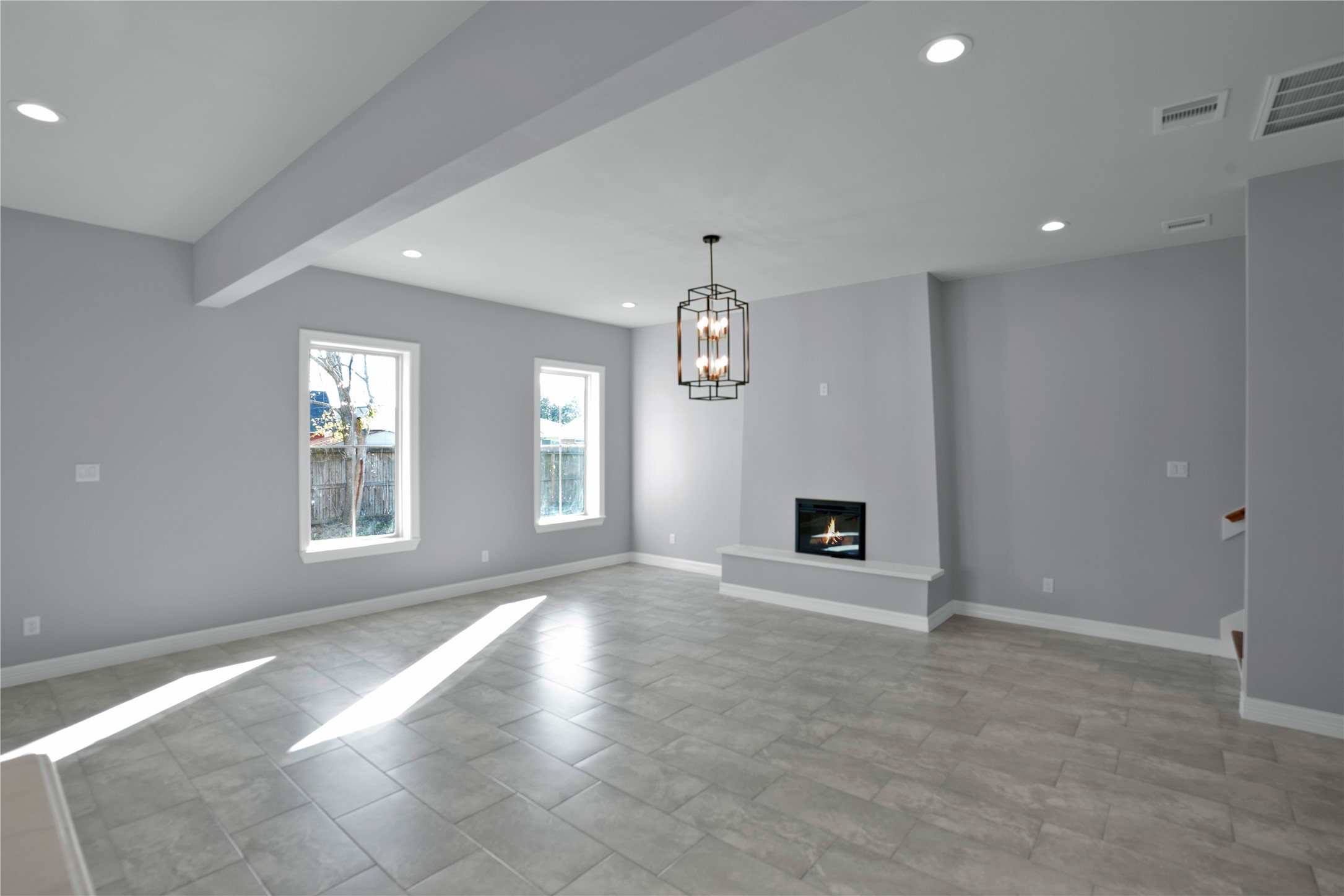 1715 Valleyview Drive La Porte, TX 77571 - Photo 8 of 15 a view of an empty room with a window and fireplace
