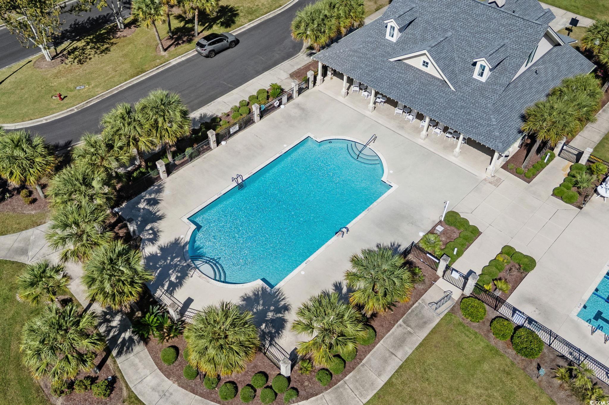 51 Summerlight Drive Murrells Inlet, SC 29576 - Photo 8 of 13 Community pool with a patio area