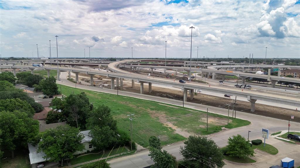 2390 Interstate 30 Mesquite, TX 75150 - Photo 16 of 19 a view of a swimming pool with a yard
