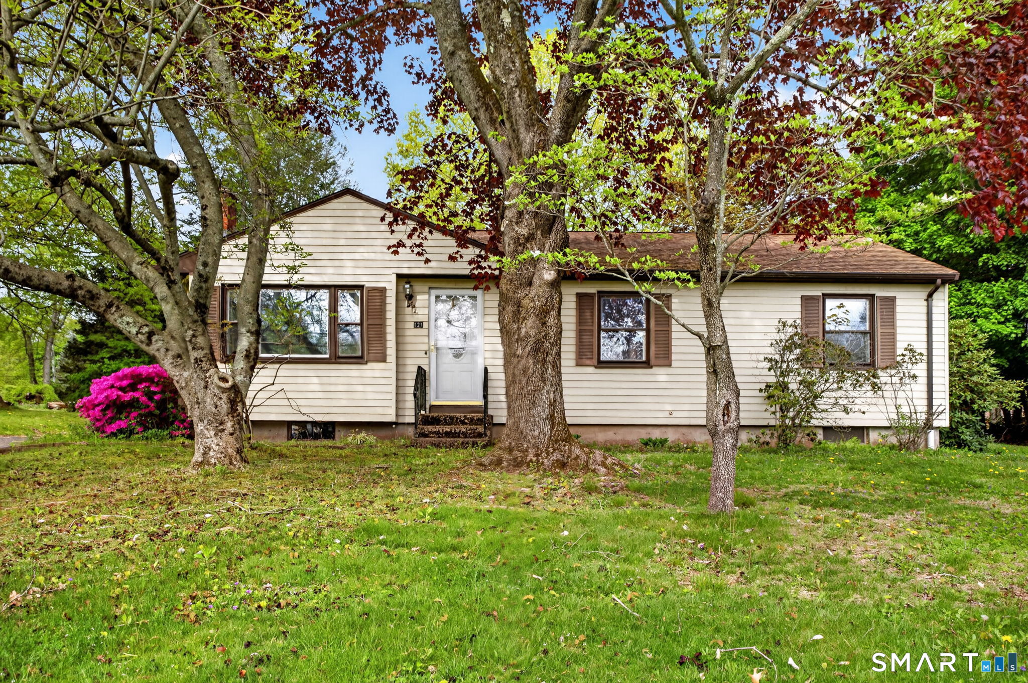 121 Cherry Hill Road Middlefield, CT 06455 - Photo 1 of 40 a front view of a house with yard