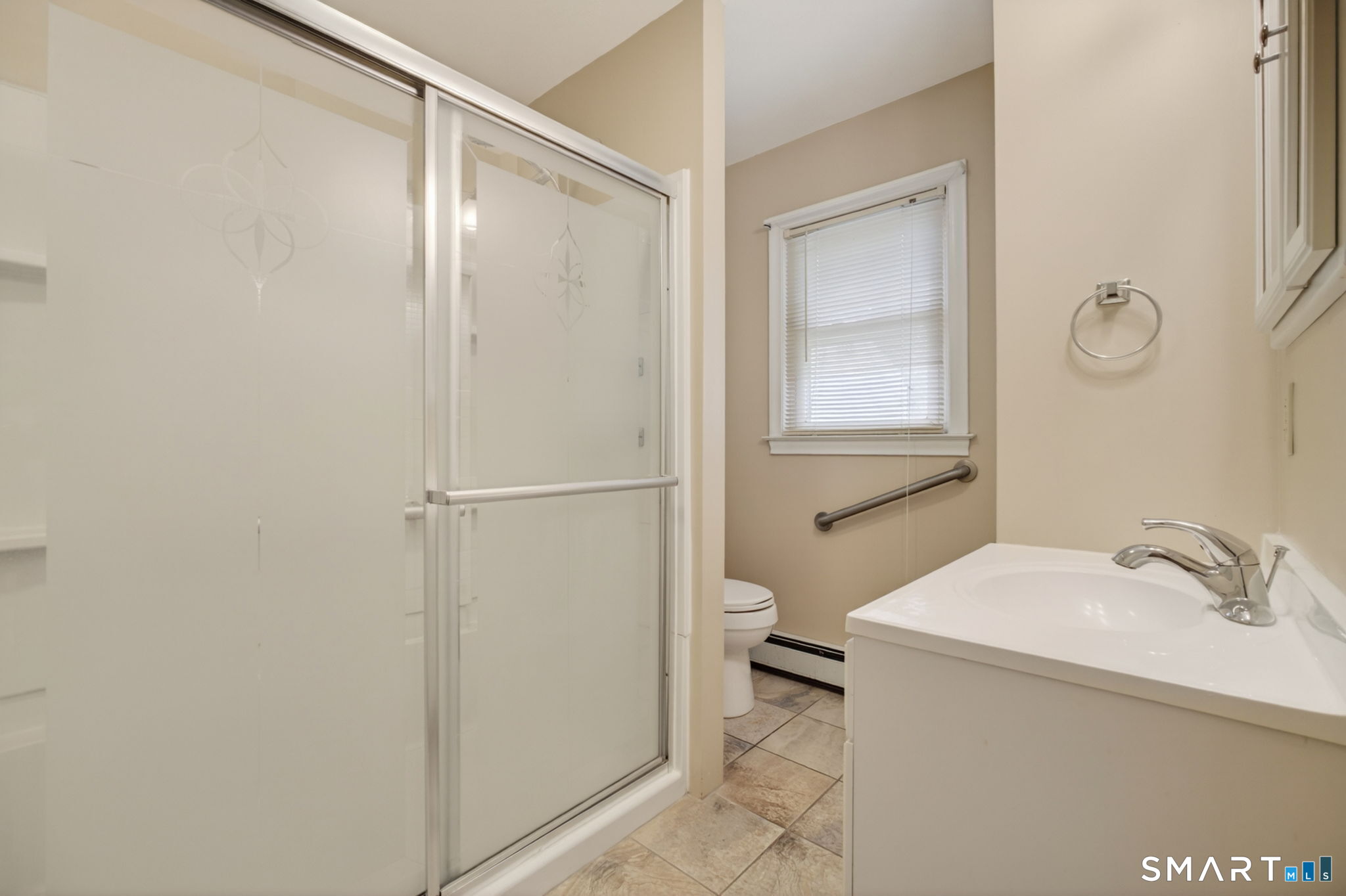 121 Cherry Hill Road Middlefield, CT 06455 - Photo 28 of 40 a bathroom with a sink a toilet and shower