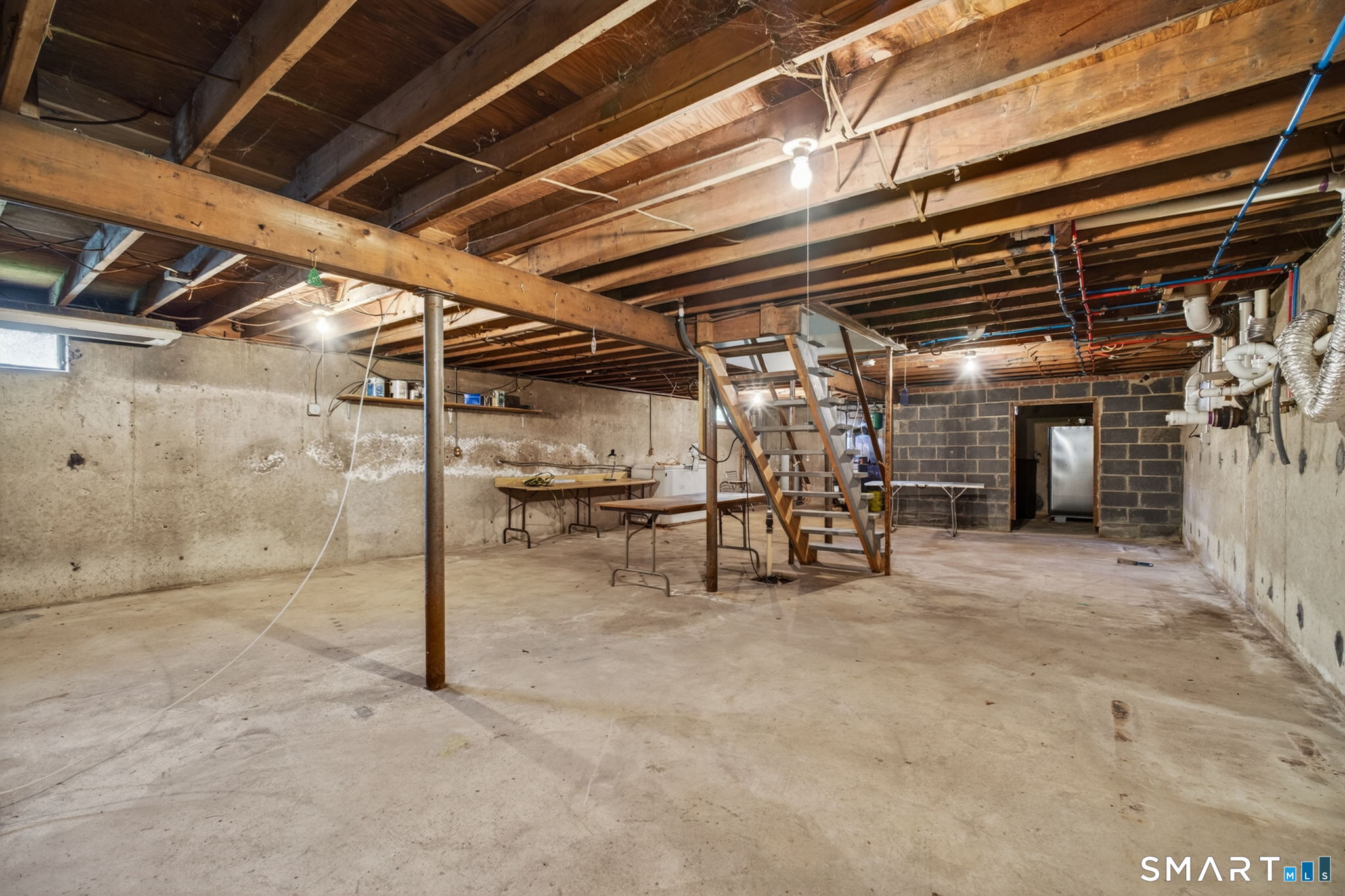 121 Cherry Hill Road Middlefield, CT 06455 - Photo 29 of 40 a view of an empty room with wooden roof