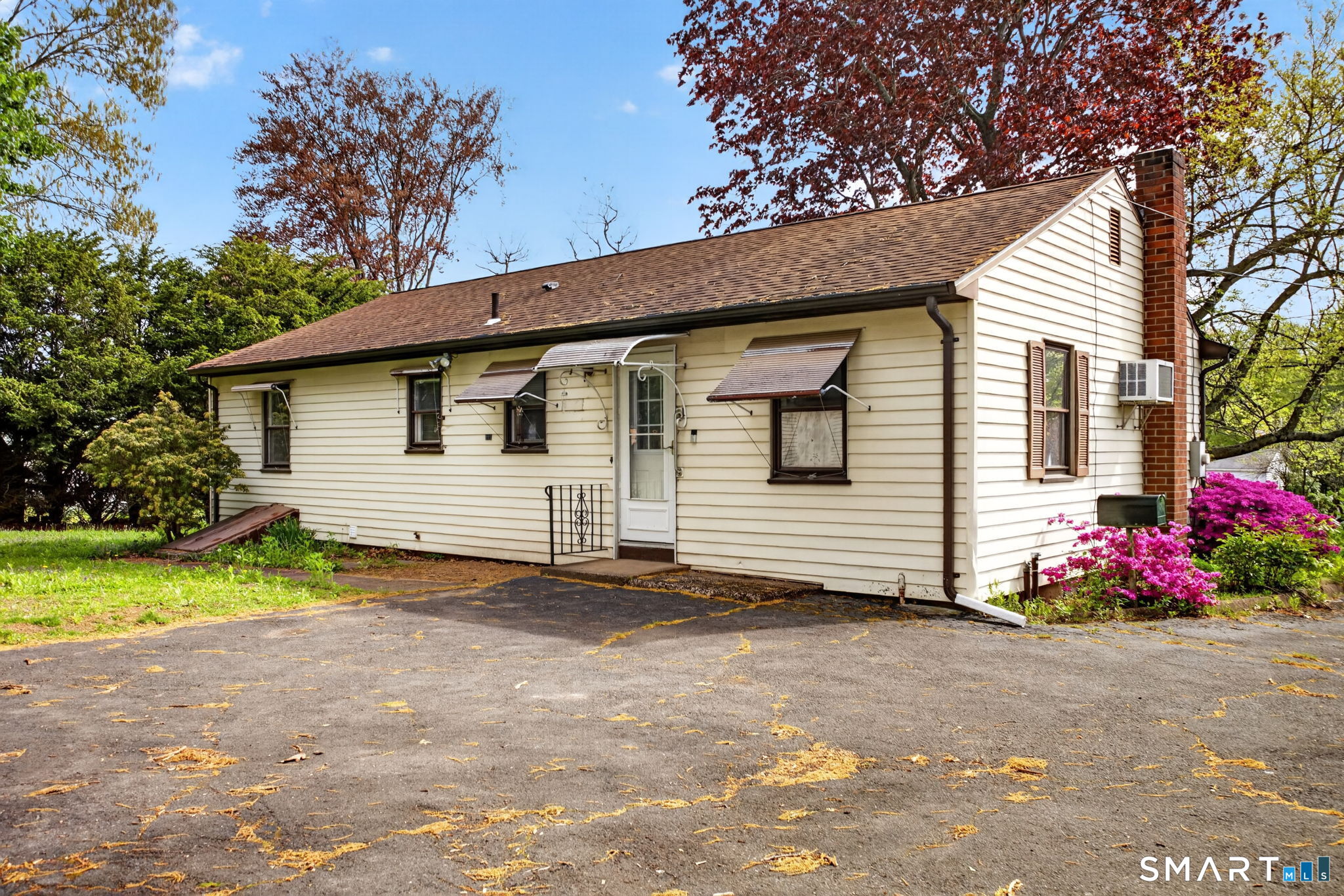 121 Cherry Hill Road Middlefield, CT 06455 - Photo 32 of 40 a view of a house with a backyard