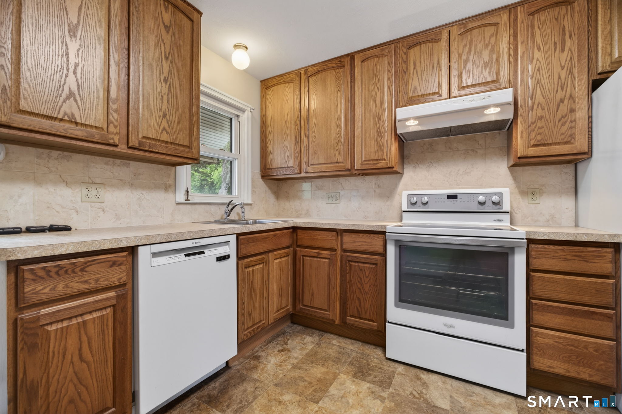 121 Cherry Hill Road Middlefield, CT 06455 - Photo 6 of 40 a kitchen with granite countertop cabinets stainless steel appliances and a sink