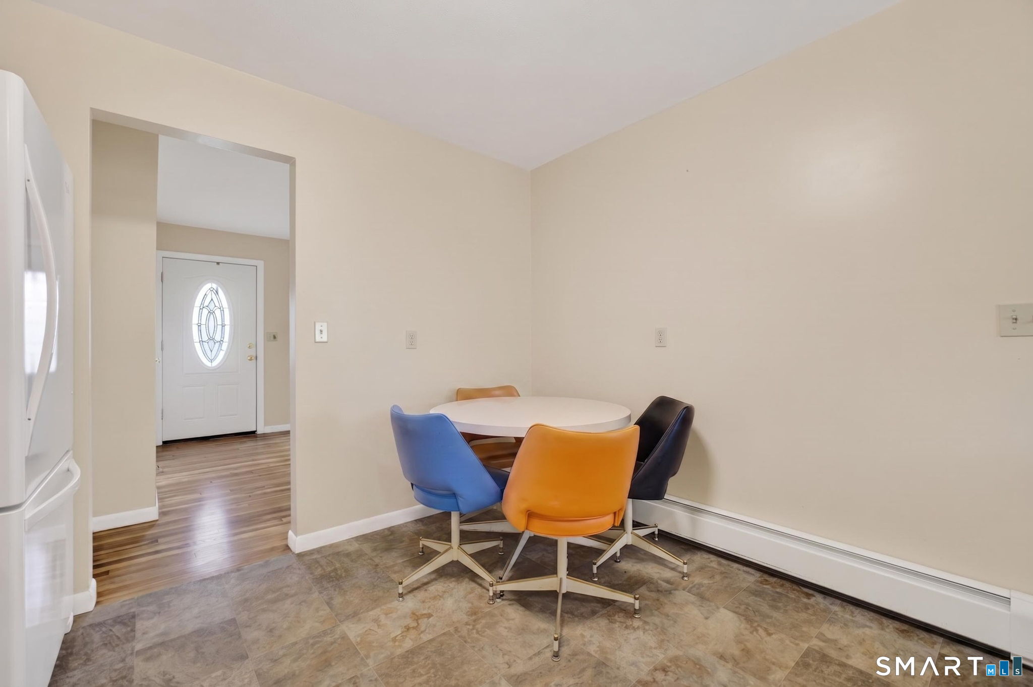 121 Cherry Hill Road Middlefield, CT 06455 - Photo 8 of 40 a view of a workspace room with wooden floor and a chair