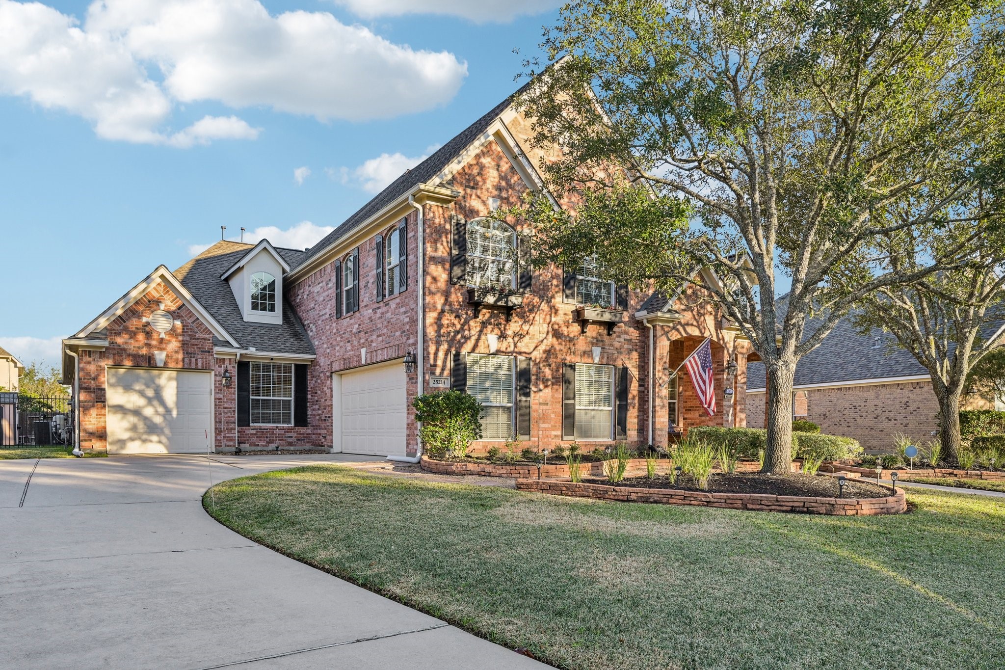 25214 East Titan Springs Drive Spring, TX 77389 - Photo 1 of 44 a view of a house with a yard