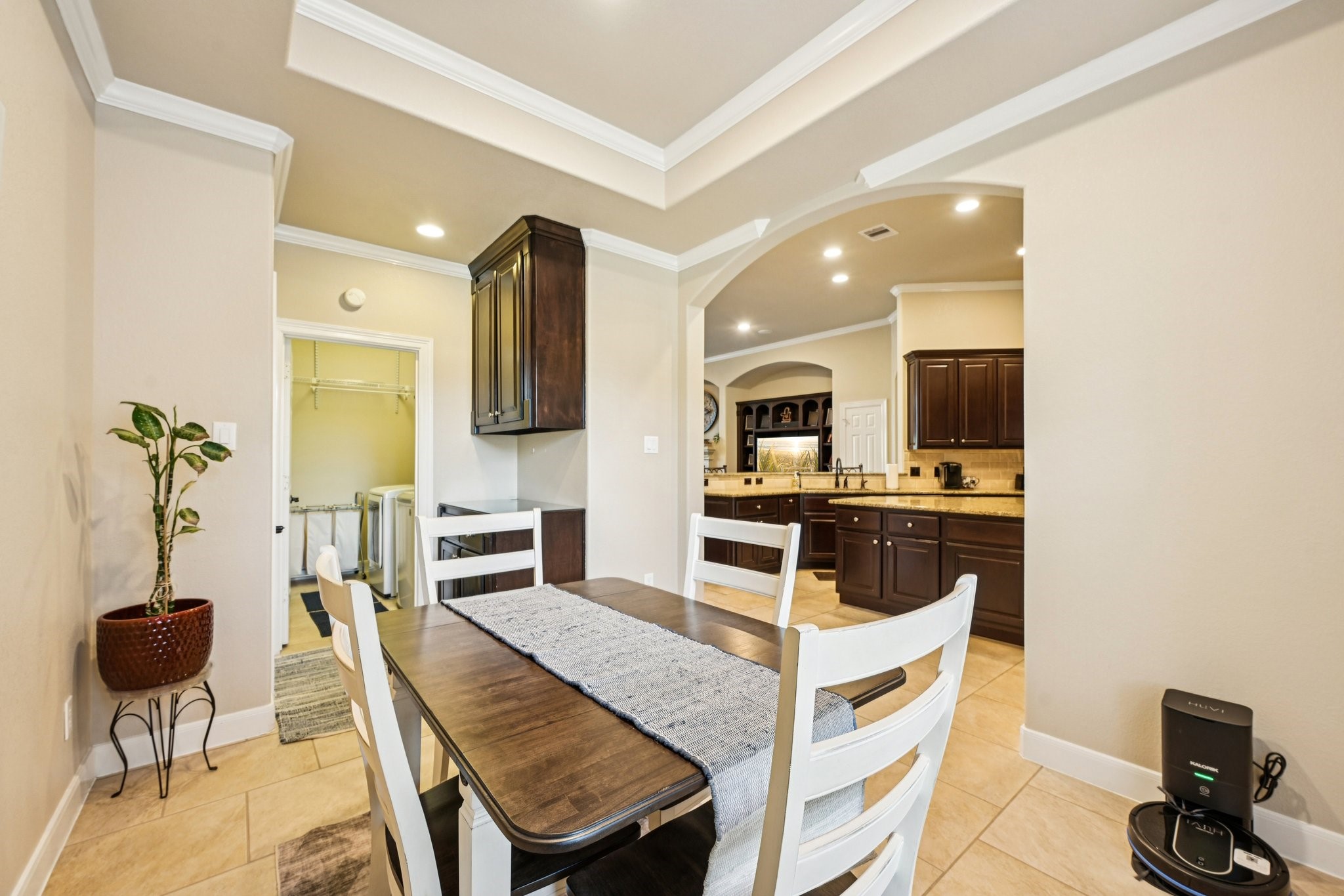 25214 East Titan Springs Drive Spring, TX 77389 - Photo 11 of 44 a kitchen with stainless steel appliances granite countertop a stove refrigerator and cabinets