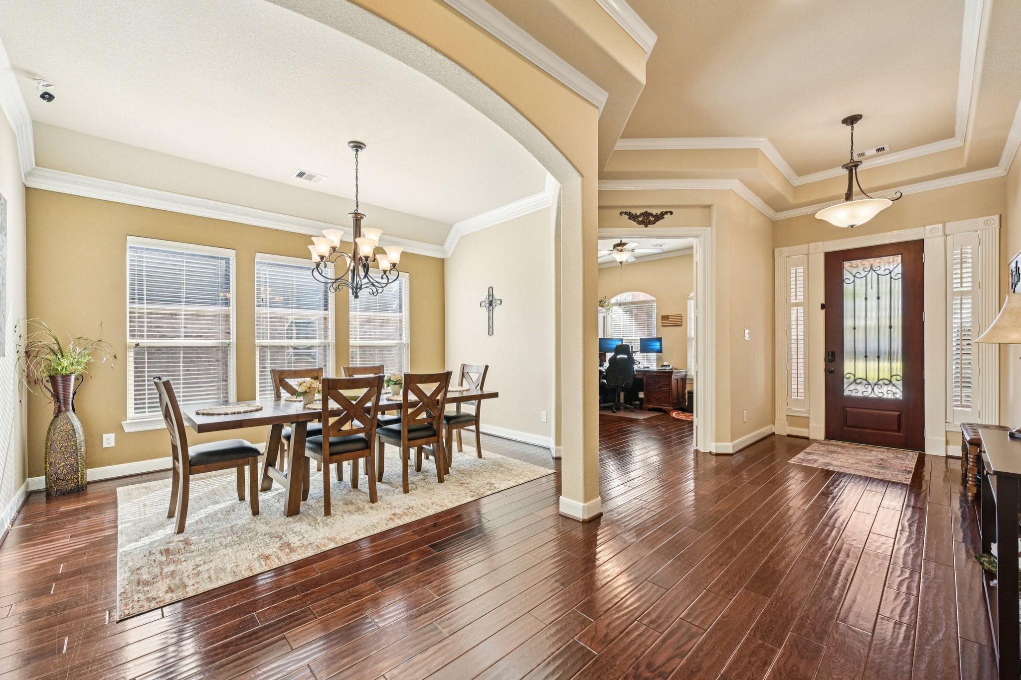 25214 East Titan Springs Drive Spring, TX 77389 - Photo 19 of 44 a view of a dining room with furniture window and wooden floor