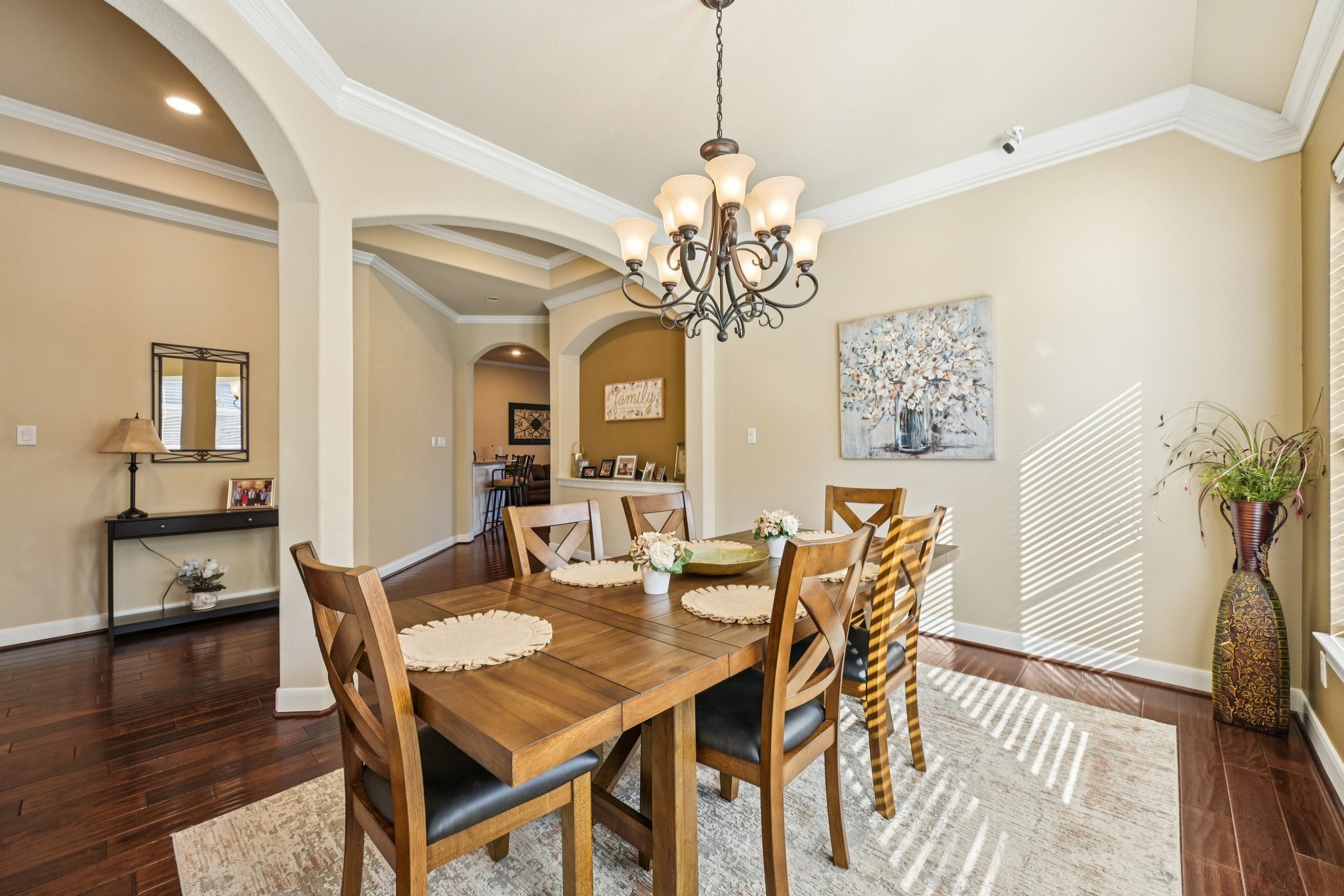 25214 East Titan Springs Drive Spring, TX 77389 - Photo 20 of 44 a view of a dining room with furniture and wooden floor