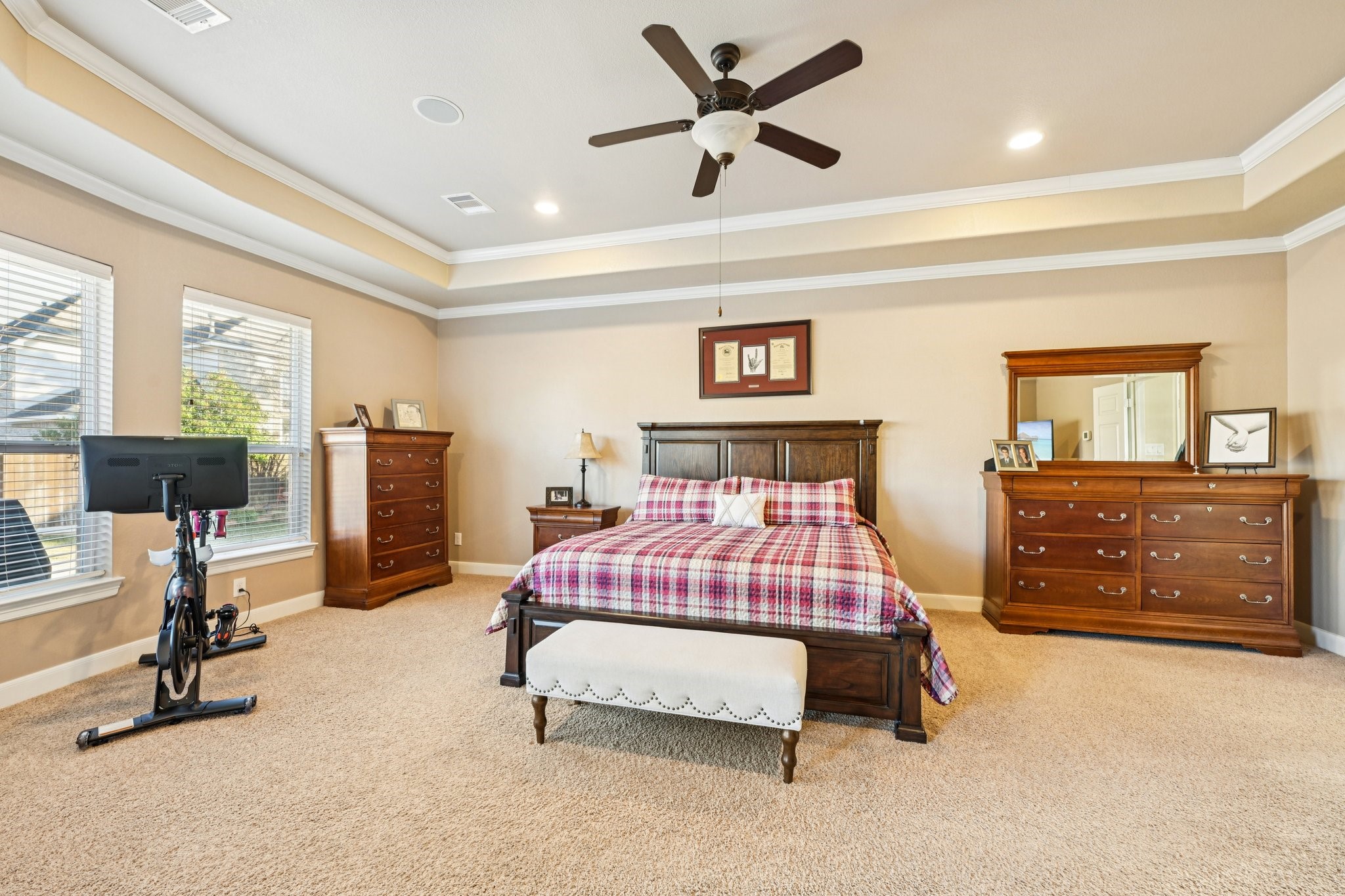 25214 East Titan Springs Drive Spring, TX 77389 - Photo 24 of 44 a bedroom with a bed a table and chair