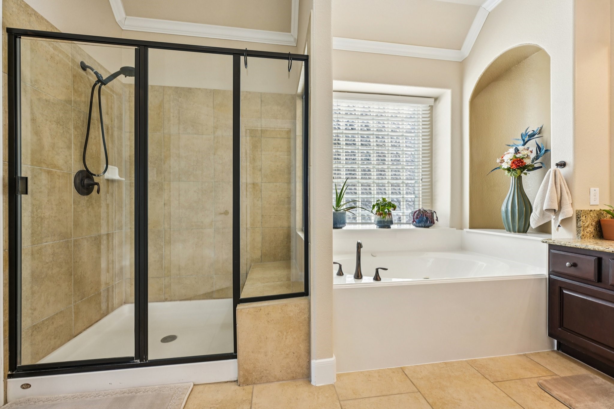25214 East Titan Springs Drive Spring, TX 77389 - Photo 27 of 44 a bathroom with a bathtub and a shower