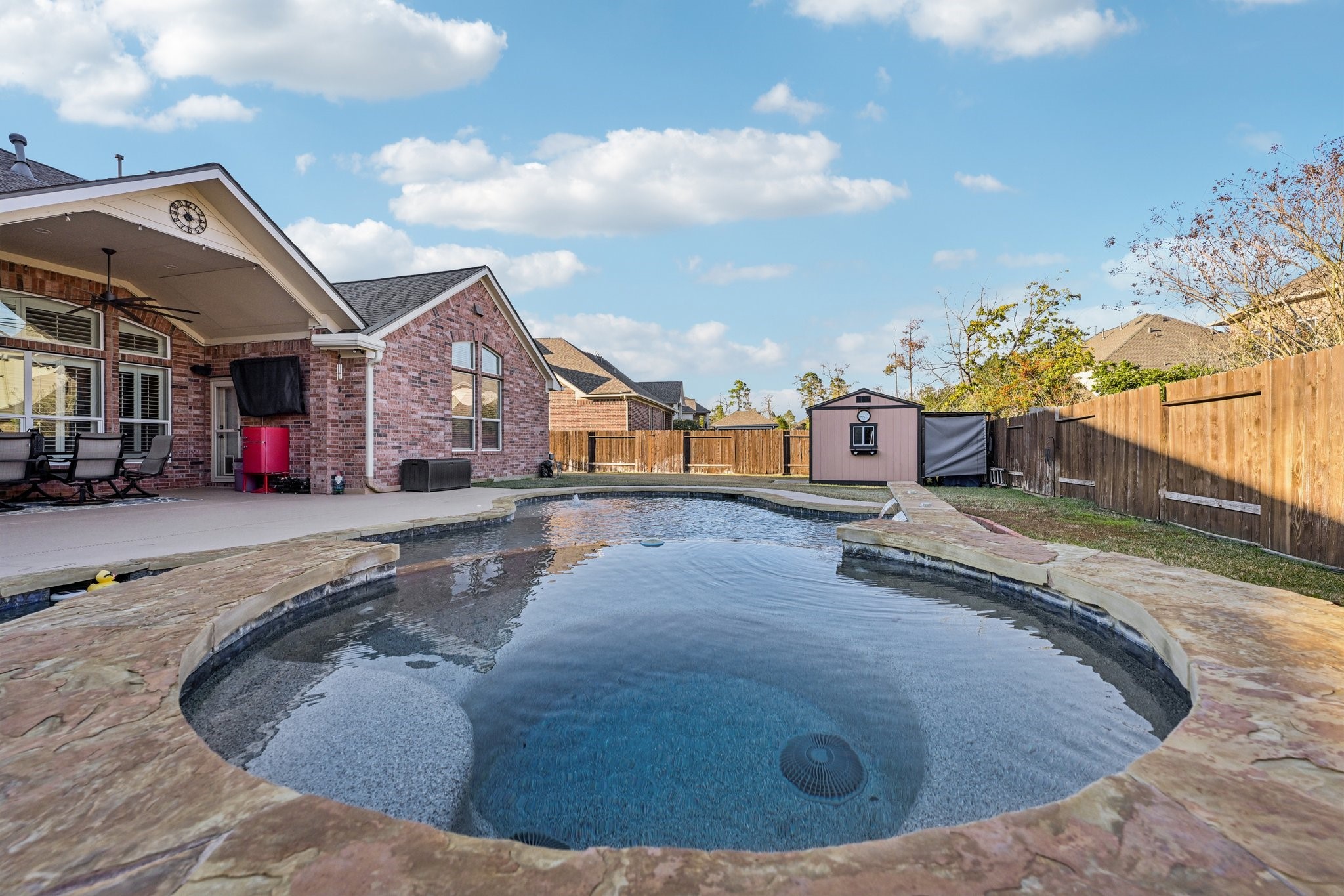25214 East Titan Springs Drive Spring, TX 77389 - Photo 40 of 44 a view of a house with outdoor space