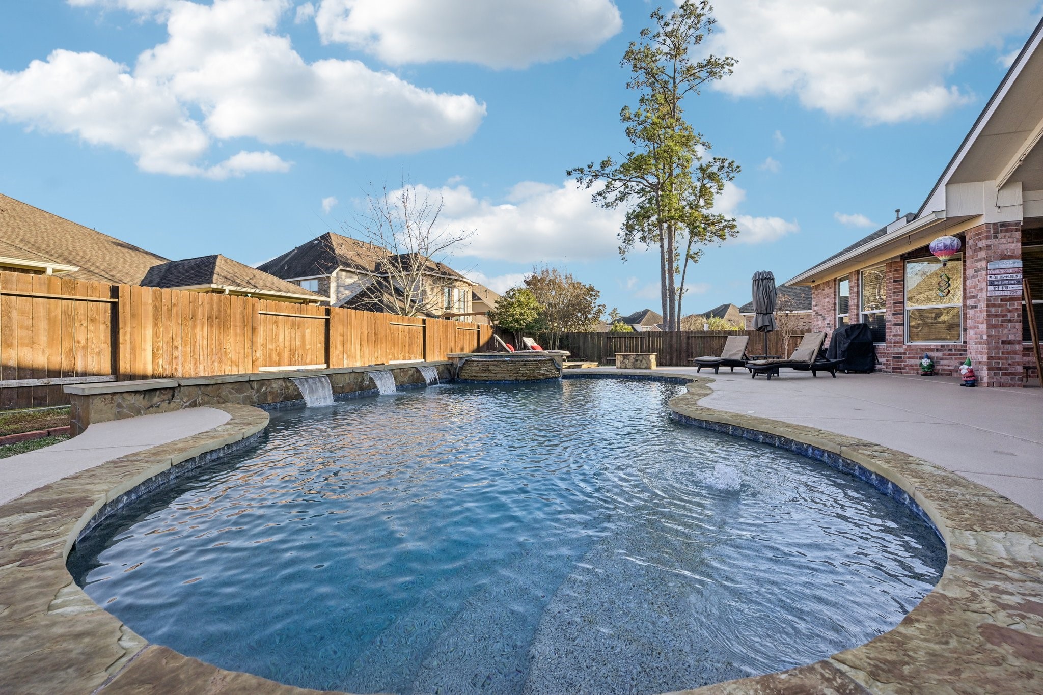 25214 East Titan Springs Drive Spring, TX 77389 - Photo 41 of 44 a view of a house with a yard
