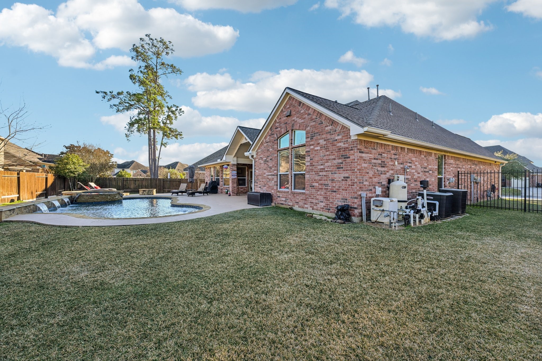 25214 East Titan Springs Drive Spring, TX 77389 - Photo 42 of 44 a view of a house with a backyard
